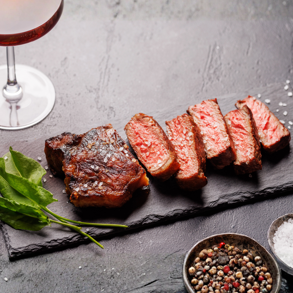 Four (4) Ribeye Steaks & Four (4) KC Strip Steaks - Wet-Aged, USDA Upper Choice/Best Beef Silver